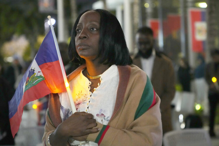 Court: Legal protections can end for Haitians and Syrians